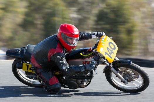 BROADFORD, VICTORIA/AUSTRALIA - APRIL 1, 2016: Classic bikes practice at Broadford Racetrack before the 2016 Shannons Victorian Historic Road Racing Championship.