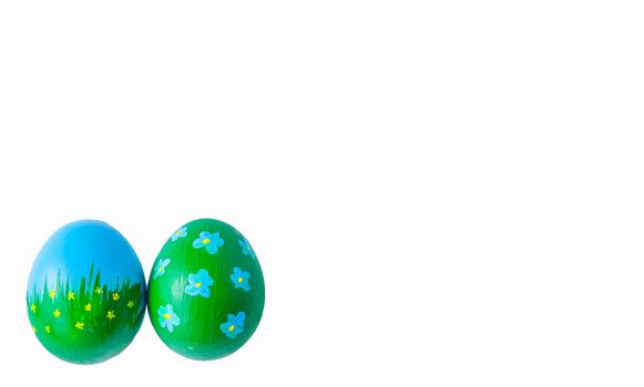 two Easter eggs on a white background