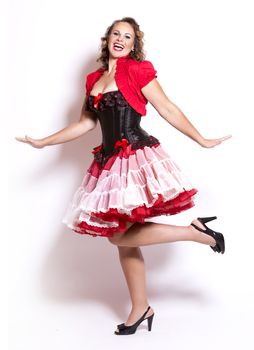 beautiful woman wearing red and black pinup outfit 