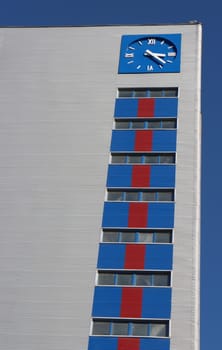 blue clock tower on a blue background