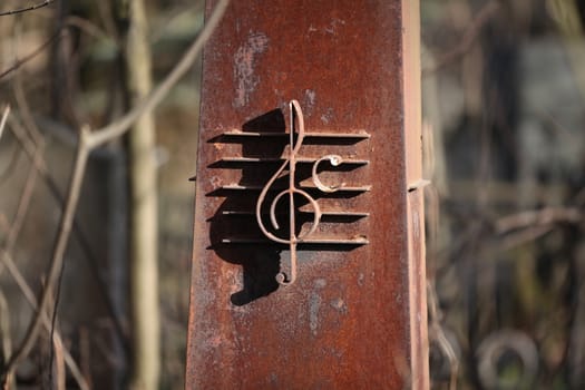 rusty Iron treble clef musician monument