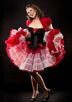 beautiful woman wearing red and black pinup outfit 