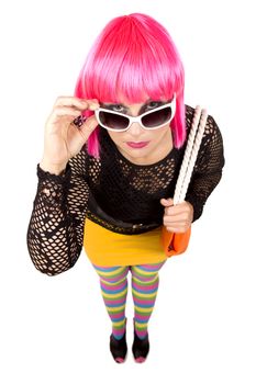 woman with pink hair wearing colorful stylish outfit