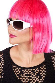 woman with pink hair wearing colorful stylish outfit