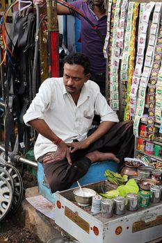 Streets of Kolkata. Making Paan in Kolkata. Areca nut and spices wrapped in a betel leaf which is chewed and then spat out