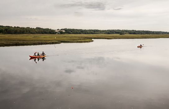 WELLS, ME - AUGUST 21: Family kayaking in winter on the coast of Maine on August 21, 2014 in Wells, Maine USA