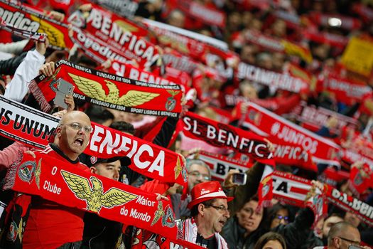 PORTUGAL, Lisbon: Benfica fans wave scarves during the Portuguese Liga football match between Benfica and SC Braga (5-1) at Luz Stadium, in Lisbon, on April 1, 2016.