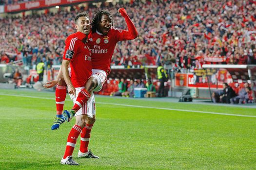 PORTUGAL, Lisbon: Benfica's forwards Jonas Gonçalves Oliveira, known as Jonas (L), and Renato Sanches, celebrate a goal during the Portuguese Liga football match between Benfica and SC Braga (5-1) at Luz Stadium, in Lisbon, on April 1, 2016.