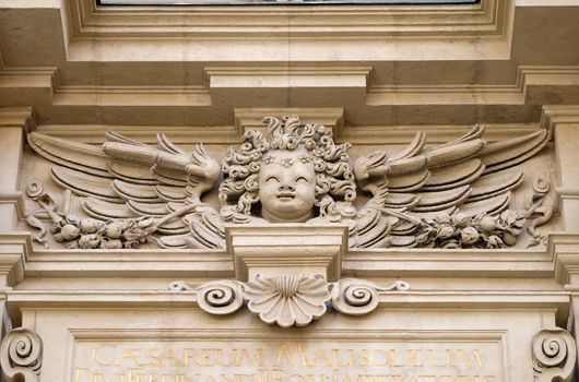 Angel on the portal of St. Catherine church and Mausoleum of Ferdinand II, Graz, Austria