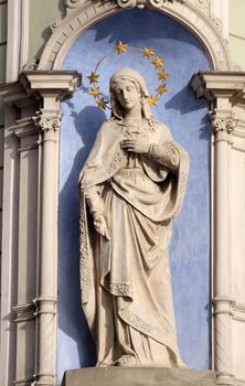 Virgin Mary, statue on the house facade in Graz, Styria, Austria