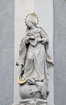 Virgin Mary, statue on the house facade in Graz, Styria, Austria