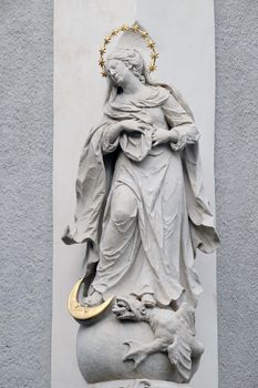 Virgin Mary, statue on the house facade in Graz, Styria, Austria