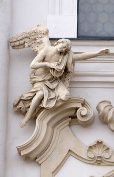 Angel on the portal of Mariahilf church in Graz, Styria, Austria