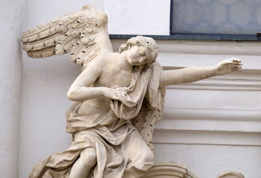 Angel on the portal of Mariahilf church in Graz, Styria, Austria