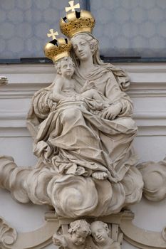 Virgin Mary with baby Jesus on the portal of Mariahilf church in Graz, Styria, Austria