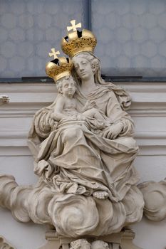 Virgin Mary with baby Jesus on the portal of Mariahilf church in Graz, Styria, Austria
