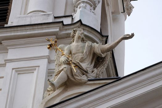 Angel on the portal of Mariahilf church in Graz, Styria, Austria
