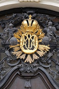 Our Lady monogram on the main entrance, Mariahilf church in Graz, Styria, Austria
