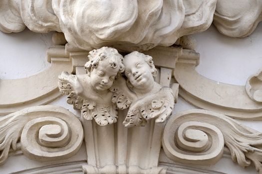 Angels on the portal of Mariahilf church in Graz, Styria, Austria