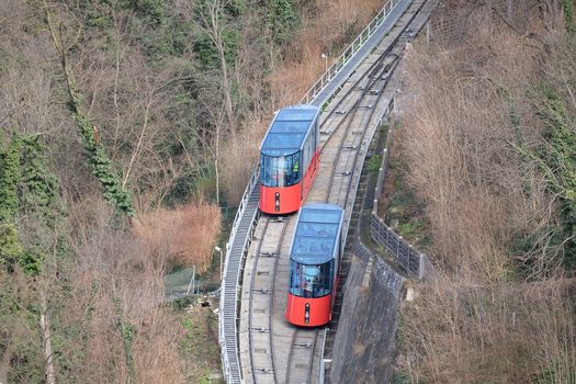 Modern funicular climbing to Schlossberg in Graz, Austria