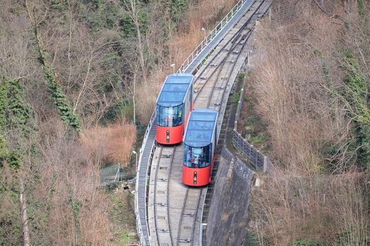 Modern funicular climbing to Schlossberg in Graz, Austria