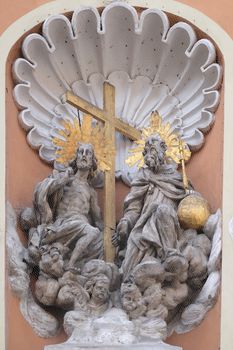Holy Trinity on the portal of Dreifaltigkeitskirche ( Holy Trinity ) church in Graz, Styria, Austria