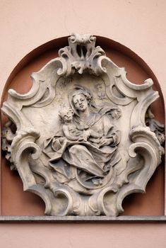 Virgin Mary with baby Jesus, statue on the house facade in Graz, Styria, Austria
