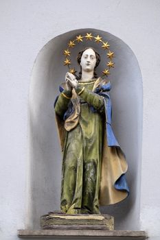Virgin Mary, statue on the house facade in Graz, Styria, Austria