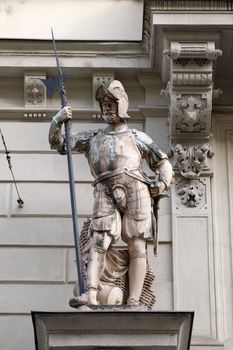 Statue of Austrian soldiers on the portal of City Hall. Graz is the capital city of Styria, Austria