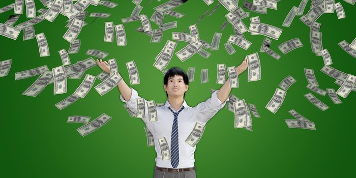 Asian Man Catching Money Falling From the Sky in US Dollars