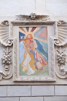 Saint Joseph, fresco painting on the house facade in Graz, Styria, Austria
