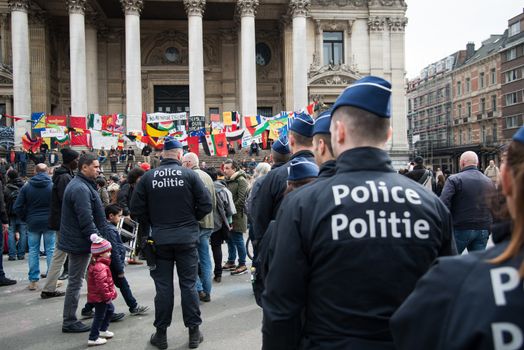 BELGIUM, Brussels: Police officers intervene at the Beurs-La Bourse square, in Bruxelles, in order to arrest antiracist activists who have tried to demonstrate even though any demonstration has been banned by Belgian authorities, on April 2, 2016.