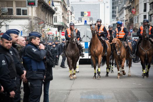 BELGIUM, Brussels: Police officers intervene at the Beurs-La Bourse square, in Bruxelles, in order to arrest antiracist activists who have tried to demonstrate even though any demonstration has been banned by Belgian authorities, on April 2, 2016.