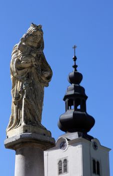 The Blessed Virgin Mary with baby Jesus in front of the parish church in Tuhelj, Croatia