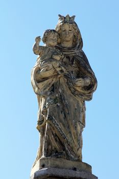 The Blessed Virgin Mary with baby Jesus in front of the parish church in Tuhelj, Croatia