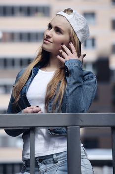 Beautiful modern girl outdoors, urban fashion youth style
