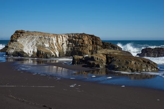 Waves coming ashore along the coast of of central Chile in the Maule Region.