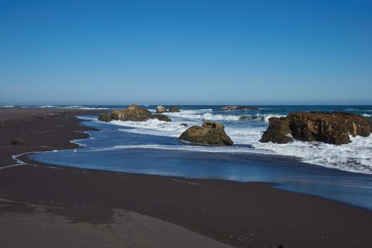 Waves coming ashore along the coast of of central Chile in the Maule Region.