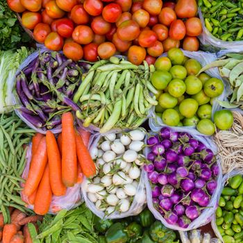 Farmers market with various domestic colorful fresh fruits and vegetable. Tasty colorful mix.