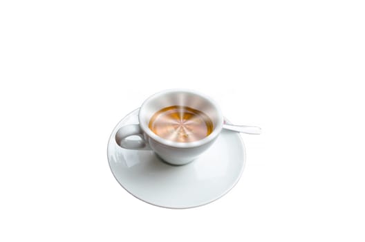 Cup of coffee on abstract silver star-shaped background.
Intentional blur. Focus on the center of the cup.