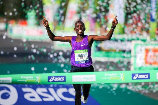 FRANCE, Paris: Kenyan Cyprian Kotut passes the finish line during the 40th Paris Marathon, on April 3, 2016 in Paris. Kenya's Cyprian Kotut won men race of 40th edition of the Paris marathon, adding to his victory in the half-marathon here less than a month ago. Some 57,000 participants from 160 countries have registered with the race covering 42,195km starting on the Champs Elysees and crossing the French capital to the Bois de Vincennes on the east.