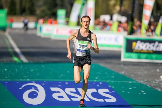 FRANCE, Paris: French Thierry Bommier passes the finish line of the 40th Paris Marathon, on April 3, 2016 in Paris. Some 57,000 participants from 160 countries have registered with the race covering 42,195km, starting on the Champs Elysees and crossing the French capital to the Bois de Vincennes on the east. 
