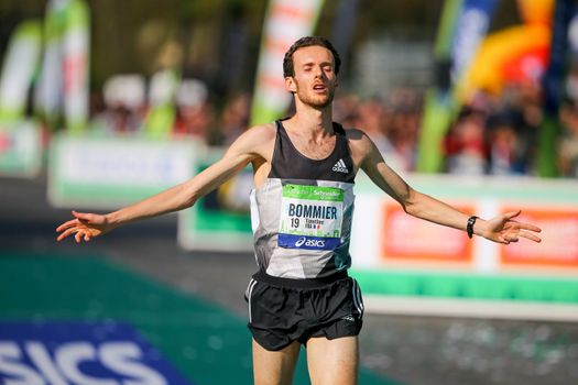 FRANCE, Paris: French Thierry Bommier passes the finish line of the 40th Paris Marathon, on April 3, 2016 in Paris. Some 57,000 participants from 160 countries have registered with the race covering 42,195km, starting on the Champs Elysees and crossing the French capital to the Bois de Vincennes on the east. 