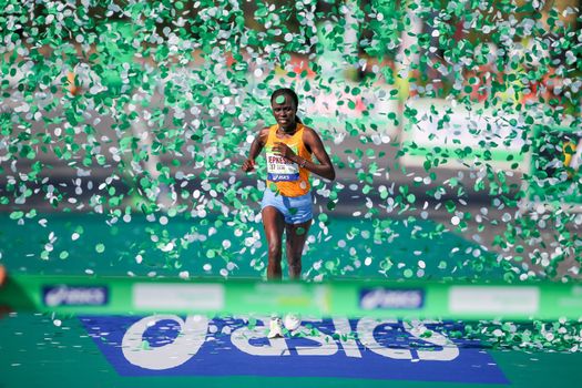 FRANCE, Paris: Kenyan Visiline Jepkesho passes the finish line during the 40th Paris Marathon, on April 3, 2016 in Paris. Kenya's Visiline Jepkesho won women race of 40th edition of the Paris marathon. Some 57,000 participants from 160 countries have registered with the race covering 42,195km starting on the Champs Elysees and crossing the French capital to the Bois de Vincennes on the east.