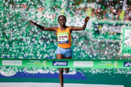 FRANCE, Paris: Kenyan Visiline Jepkesho passes the finish line during the 40th Paris Marathon, on April 3, 2016 in Paris. Kenya's Visiline Jepkesho won women race of 40th edition of the Paris marathon. Some 57,000 participants from 160 countries have registered with the race covering 42,195km starting on the Champs Elysees and crossing the French capital to the Bois de Vincennes on the east.