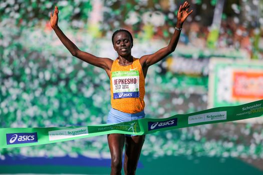 FRANCE, Paris: Kenyan Visiline Jepkesho passes the finish line during the 40th Paris Marathon, on April 3, 2016 in Paris. Kenya's Visiline Jepkesho won women race of 40th edition of the Paris marathon. Some 57,000 participants from 160 countries have registered with the race covering 42,195km starting on the Champs Elysees and crossing the French capital to the Bois de Vincennes on the east.