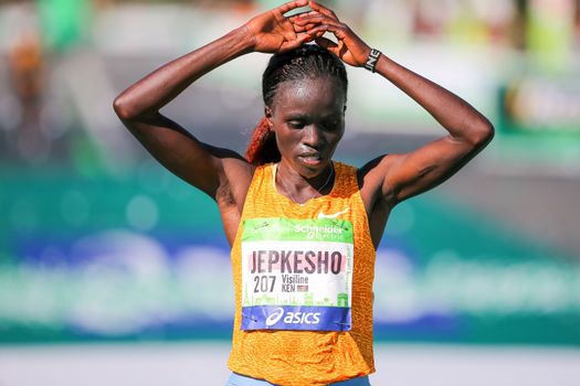 FRANCE, Paris: Kenyan Visiline Jepkesho passes the finish line during the 40th Paris Marathon, on April 3, 2016 in Paris. Kenya's Visiline Jepkesho won women race of 40th edition of the Paris marathon. Some 57,000 participants from 160 countries have registered with the race covering 42,195km starting on the Champs Elysees and crossing the French capital to the Bois de Vincennes on the east.