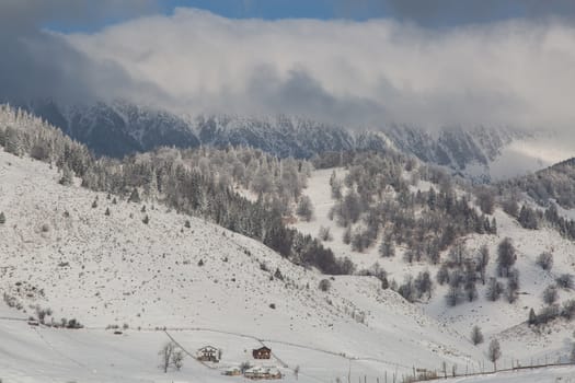 Winter lanscapes in Transylvania with the mountains Bucegi.