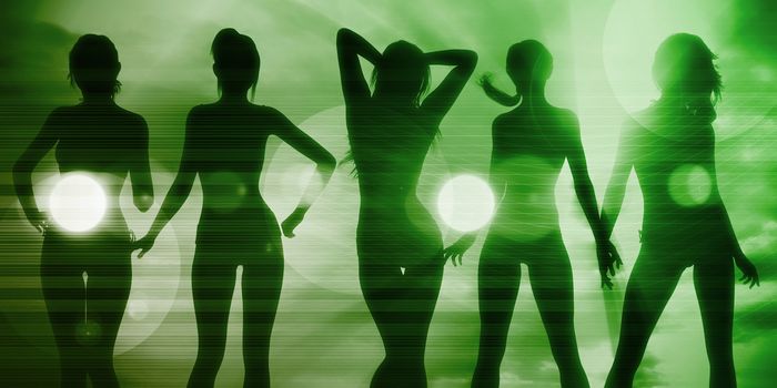 Silhouette of Women Posing at the Beach Together