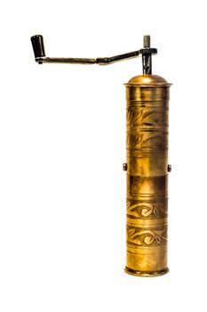 Hand coffee grinder made of brass on white background